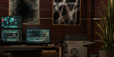A private shelter with a desk, monitors, and supplies.